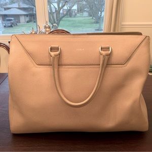Gently used Furla purse. Classic style. Includes shoulder strap. Beige color